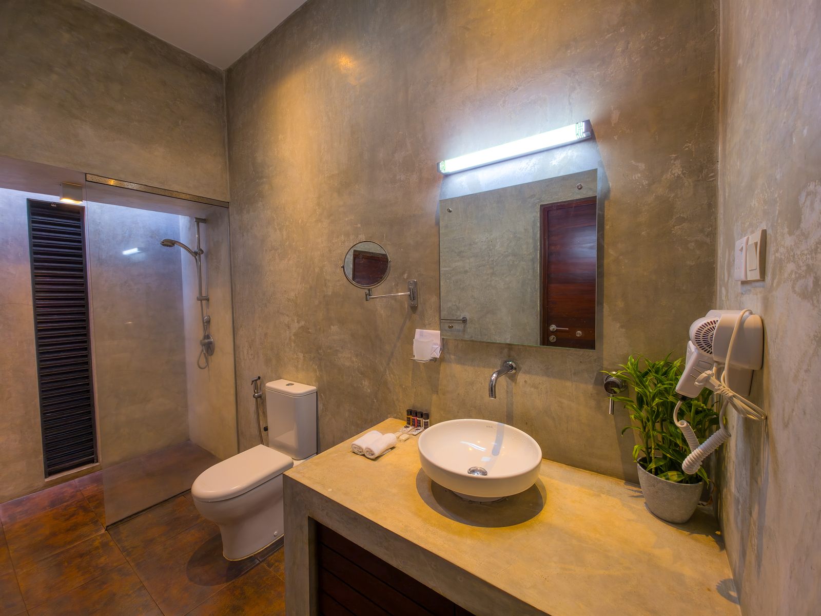 Deluxe Room bathroom vanity and shower
