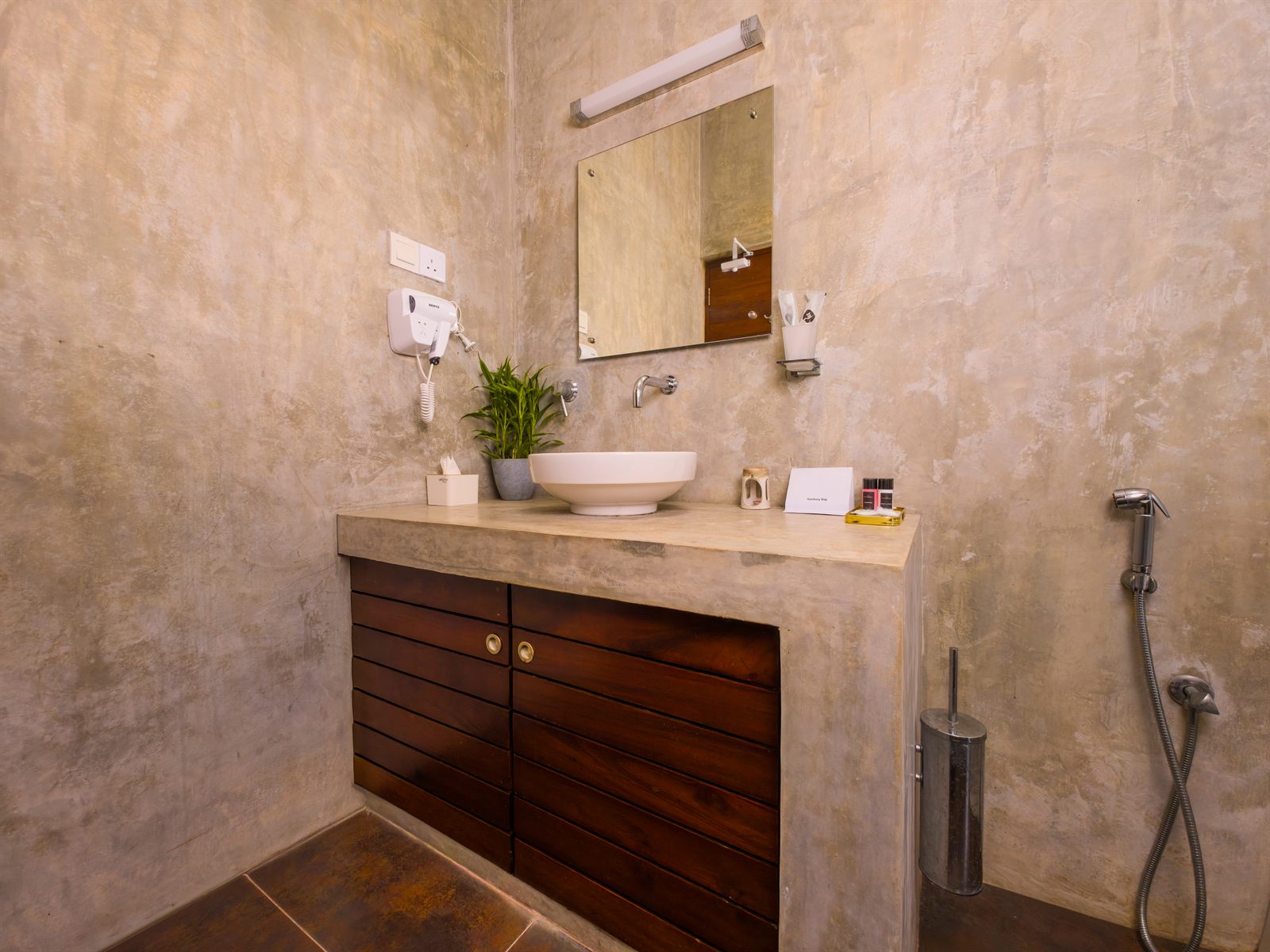 Superior Room bathroom sink and wooden vanity